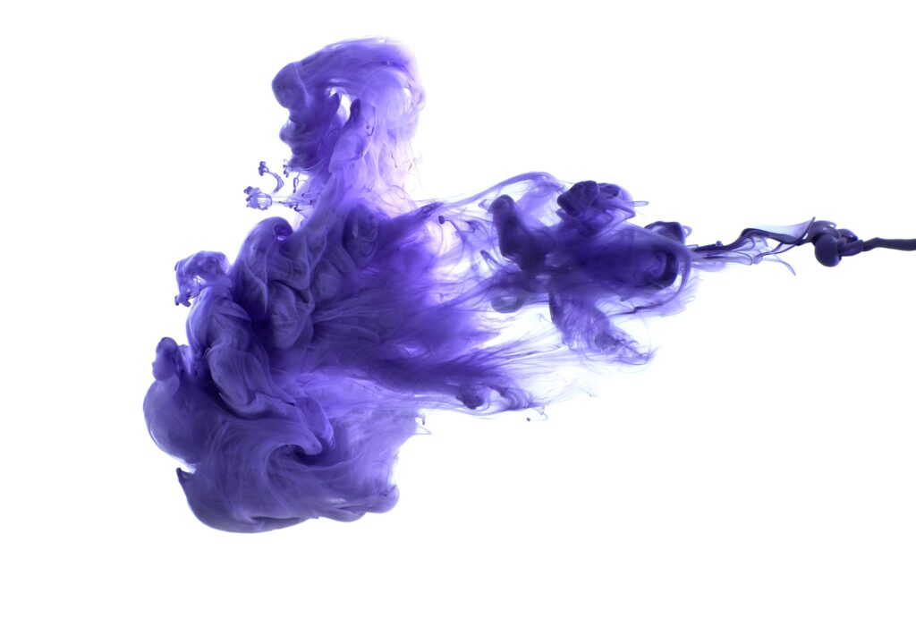 Purple acrylic paint in water.